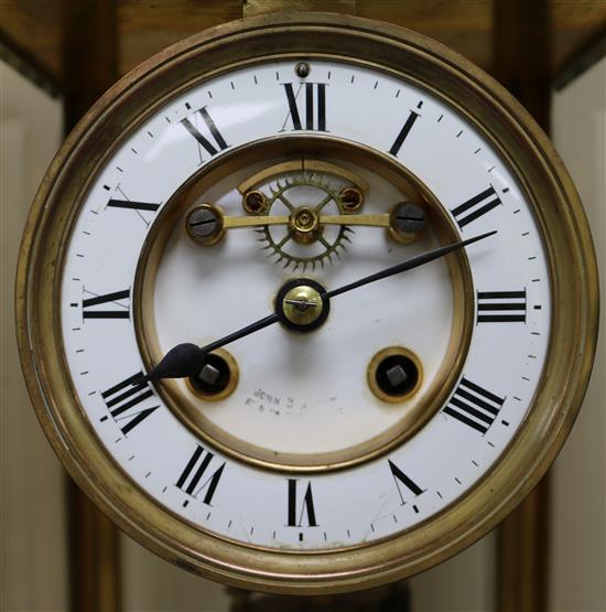 A Victorian brass four glass mantel clock, 12in.